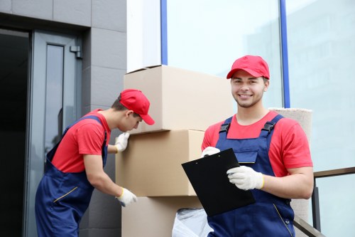 Flat removals team handling a move in Kingston Upon Thames apartment access