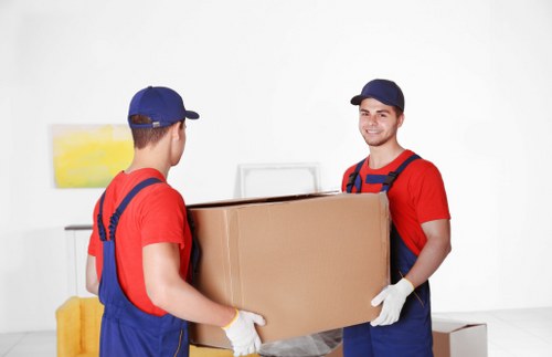 Same day removals team loading furniture in Kingston Upon Thames
