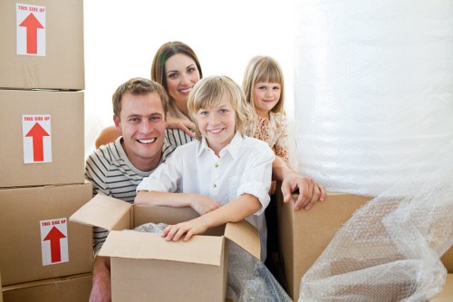 Furniture and boxes being transported by a Kingston upon Thames moving van